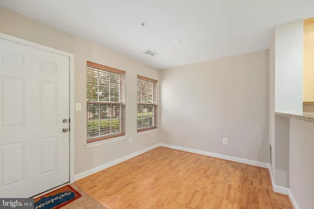 an empty room with windows