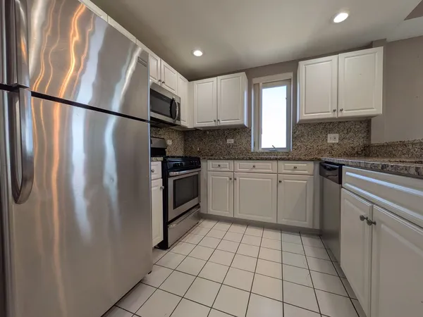 a utility room with dryer