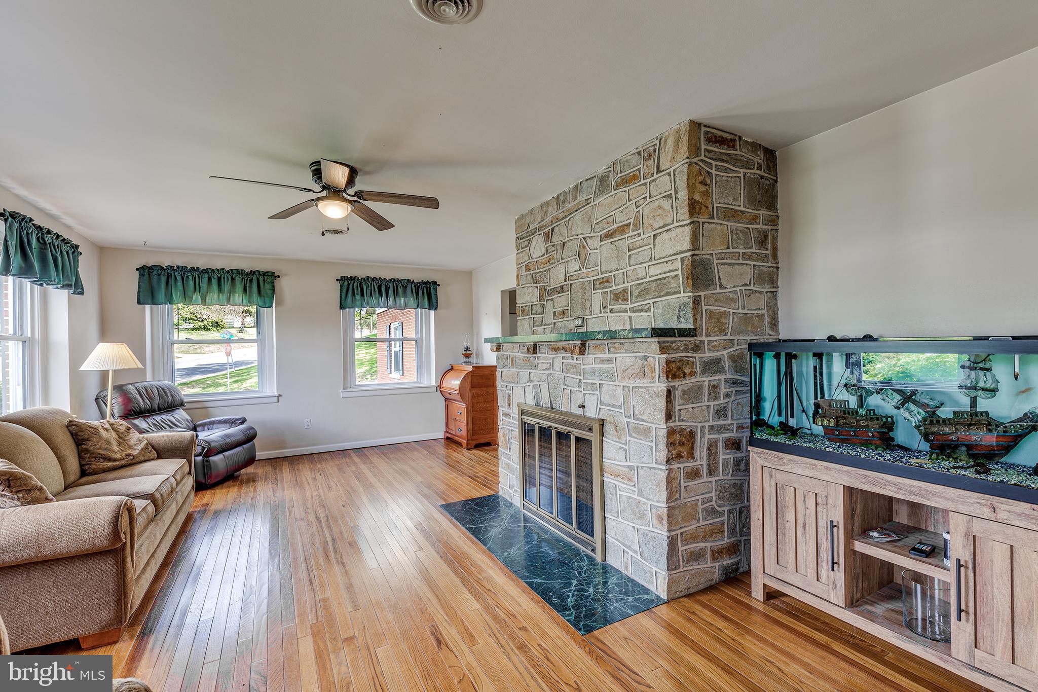 402 West Pearl Street Rising Sun, MD 21911 - Photo 7 of 23 a living room with furniture and a fireplace