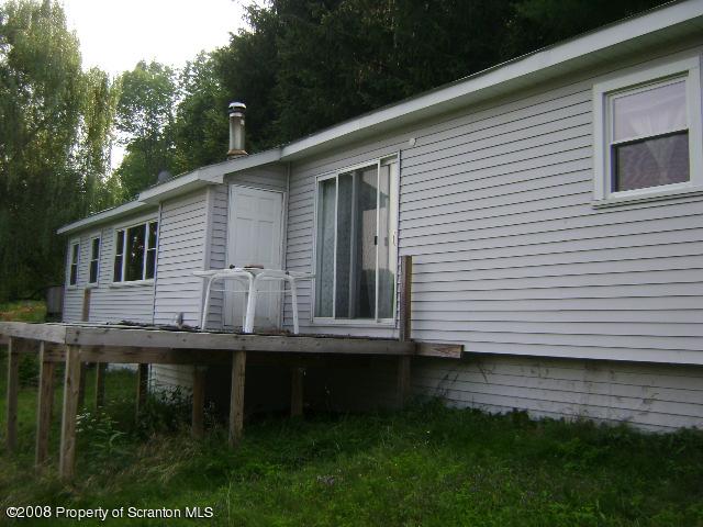 Rr1 Rr1 Hop Bottom, PA 18824 - Photo 1 of 12 a view of house with backyard