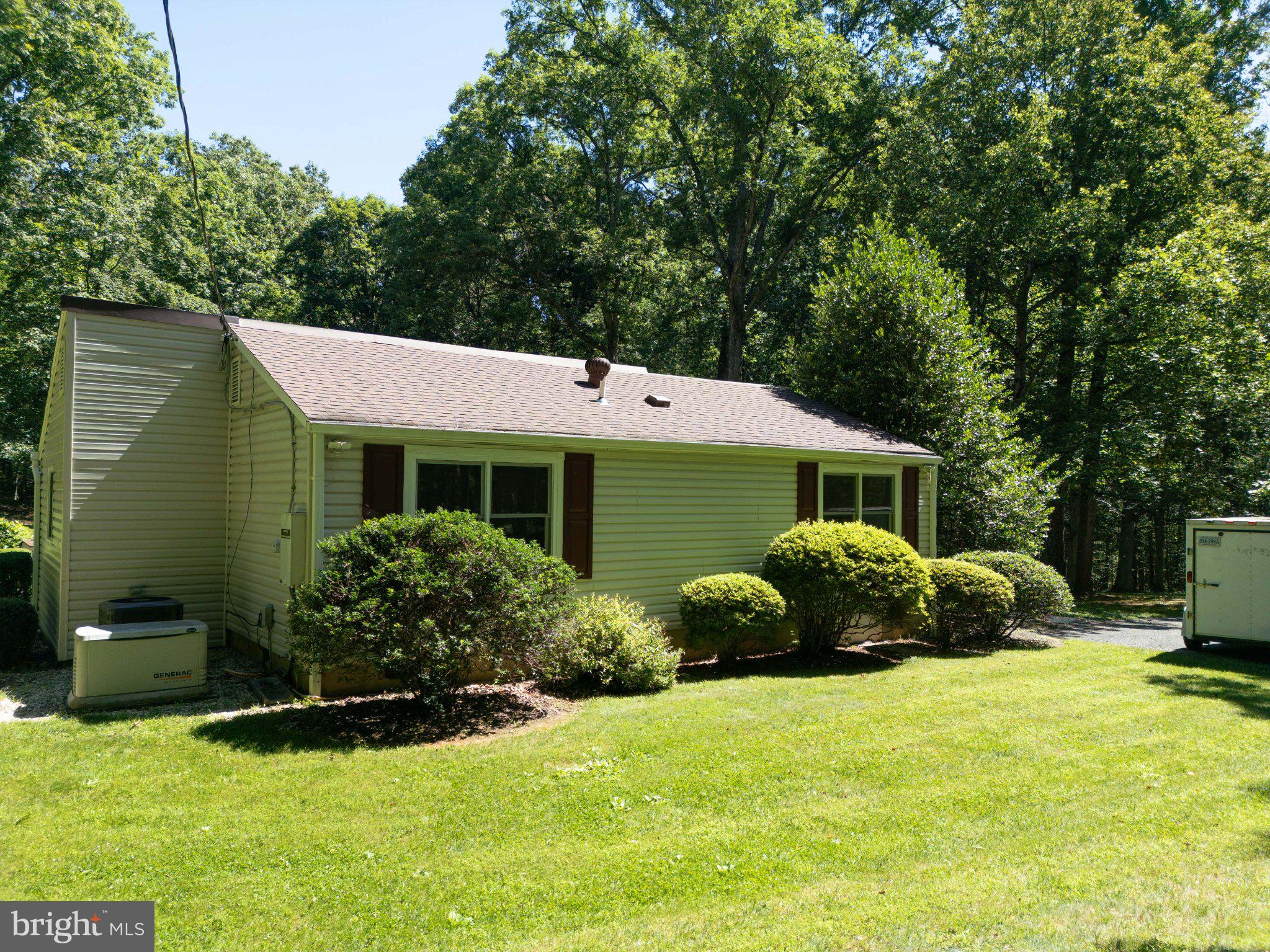 6067 Pilgrims Rest Road Broad Run, VA 20137 - Photo 42 of 58 Charming home nestled in lush greenery.