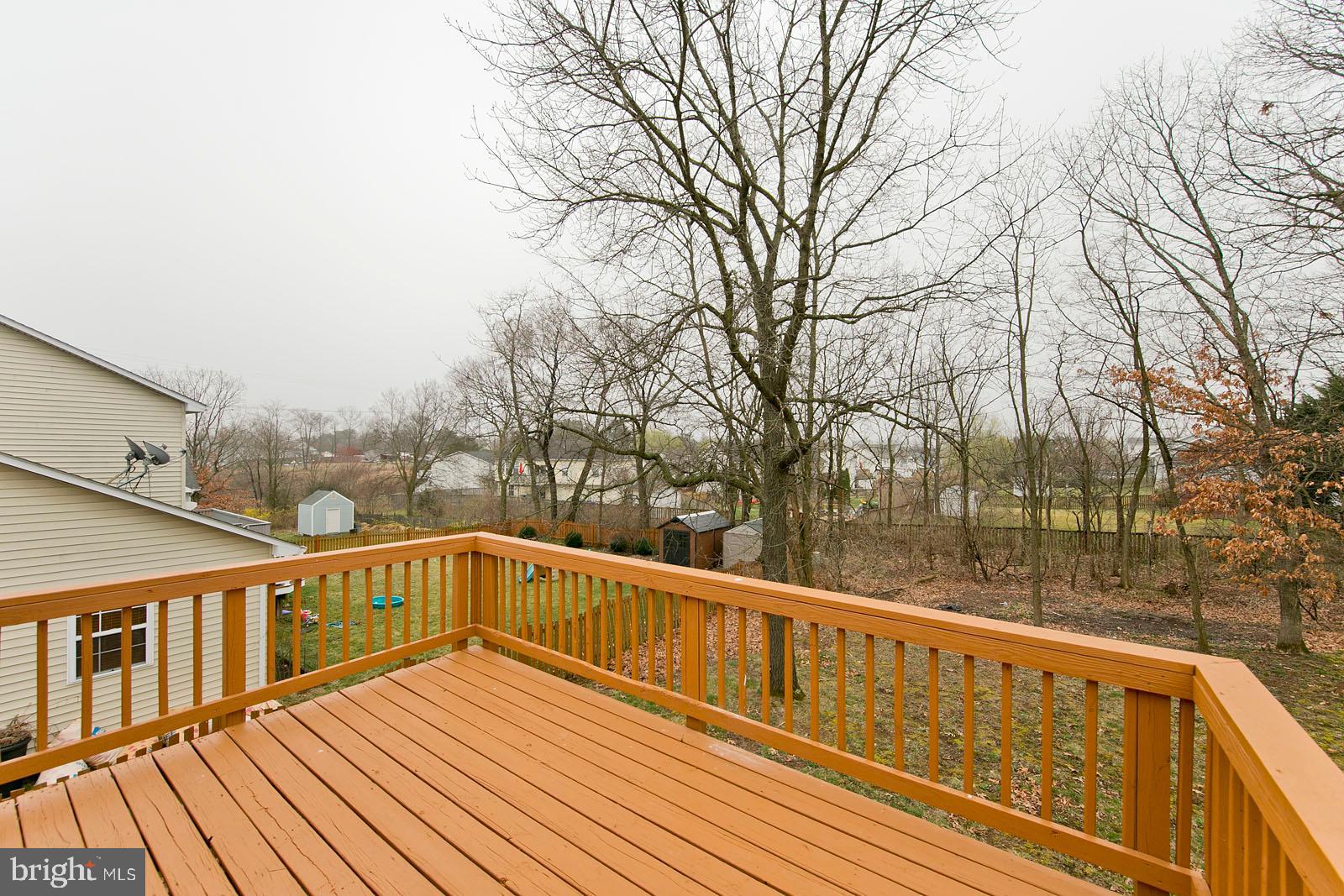 116 Woodrow Road Winchester, VA 22602 - Photo 14 of 42 Deck and fenced backyard