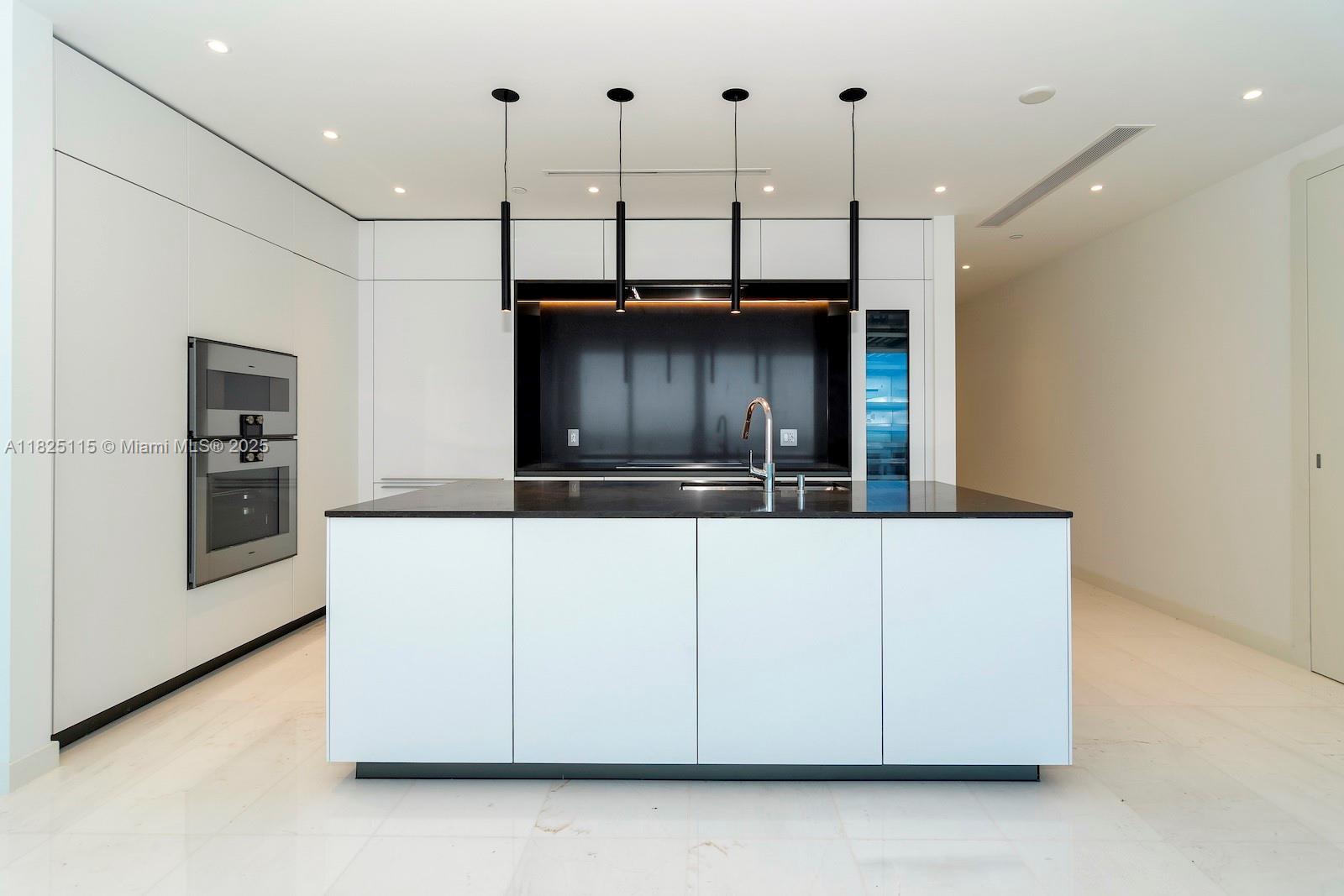 300 Biscayne Blvd Way, Unit 3902 Miami, FL 33131 - Photo 12 of 41 a living room with stainless steel appliances kitchen island granite countertop furniture