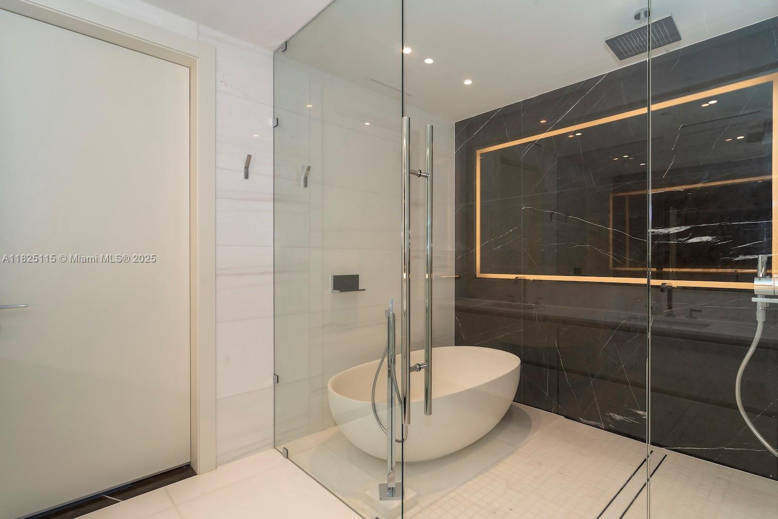 300 Biscayne Blvd Way, Unit 3902 Miami, FL 33131 - Photo 31 of 41 a bathroom with a toilet and a shower