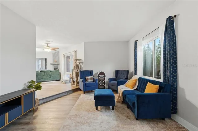 a kitchen with stainless steel appliances granite countertop a sink a stove and refrigerator