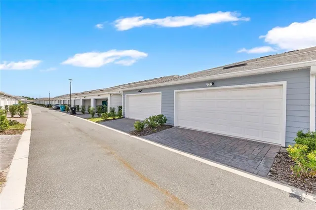 a view of a house with a street