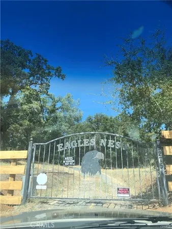 a view of swimming pool with mountain view and wooden floor