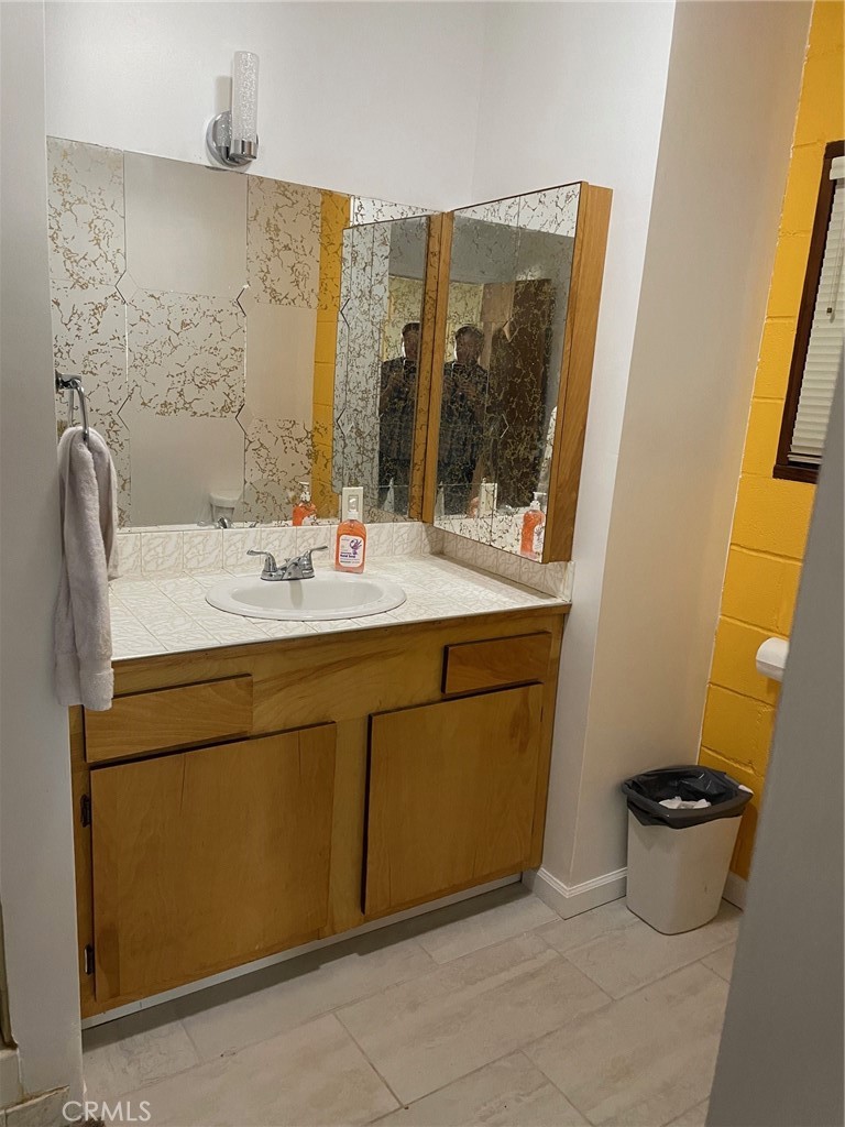 9275 Sheep Ranch Road Mountain Ranch, CA 95246 - Photo 5 of 18 a bathroom with a sink and a mirror