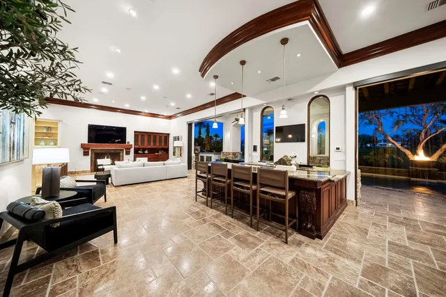 a view of a chairs and tables in the patio