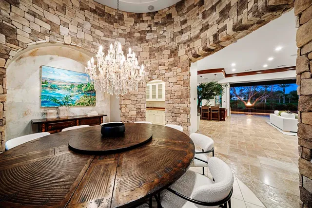 a bathroom with a granite countertop sink mirror and vanity