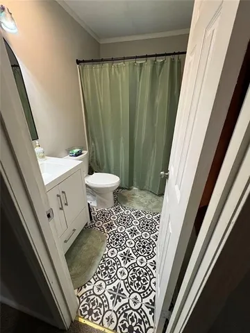 a bathroom with a sink and a toilet