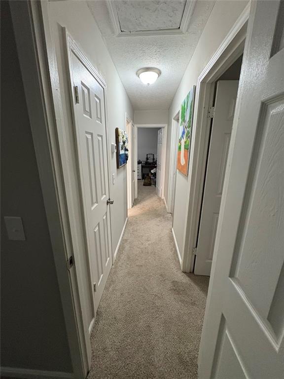 38 Daniel Circle Franklin, GA 30217 - Photo 14 of 27 a view of a hallway with windows and stairs