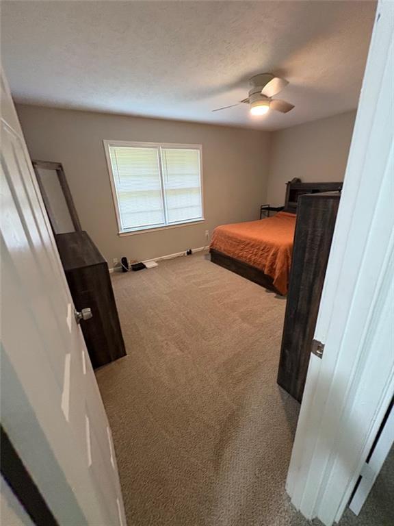 38 Daniel Circle Franklin, GA 30217 - Photo 18 of 27 a bedroom with a bed and a window