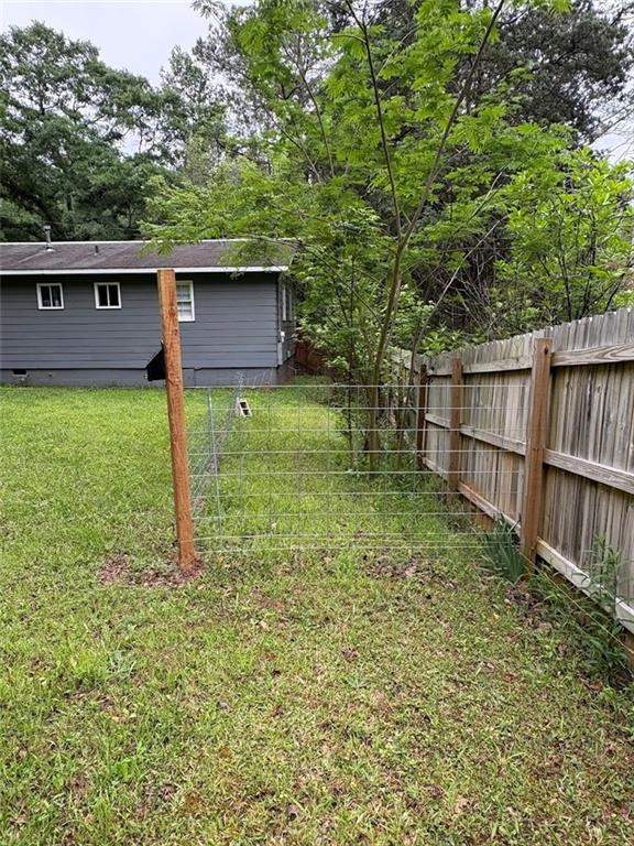 38 Daniel Circle Franklin, GA 30217 - Photo 23 of 27 a backyard of a house with lots of green space