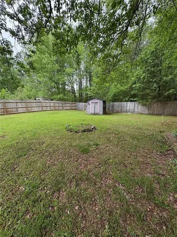 a view of outdoor space and yard