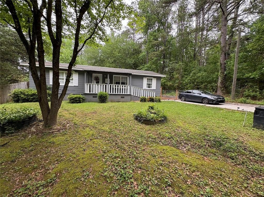 38 Daniel Circle Franklin, GA 30217 - Photo 26 of 27 a front view of a house with garden