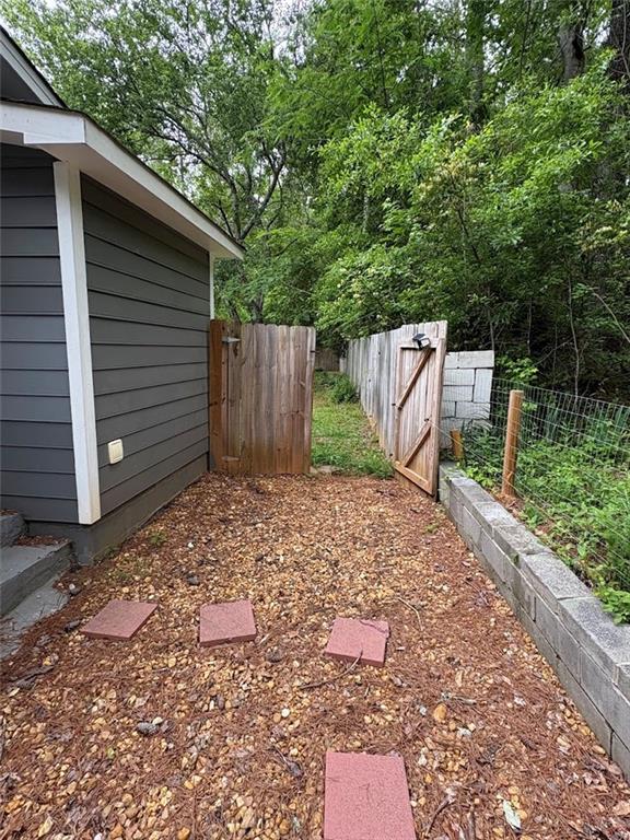 38 Daniel Circle Franklin, GA 30217 - Photo 4 of 27 a backyard of a house