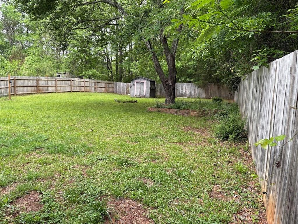 38 Daniel Circle Franklin, GA 30217 - Photo 5 of 27 a view of a backyard with a small cabin