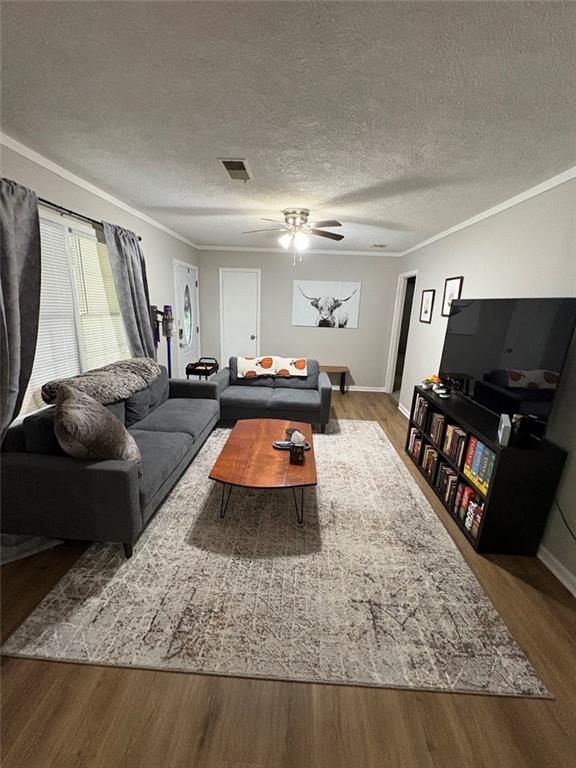 38 Daniel Circle Franklin, GA 30217 - Photo 6 of 27 a living room with furniture and a flat screen tv