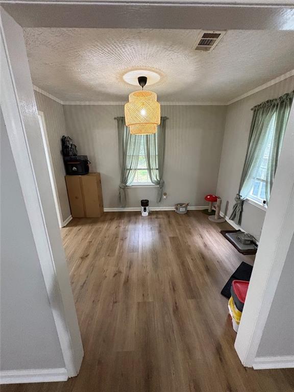 38 Daniel Circle Franklin, GA 30217 - Photo 9 of 27 a room with wooden floor and furniture