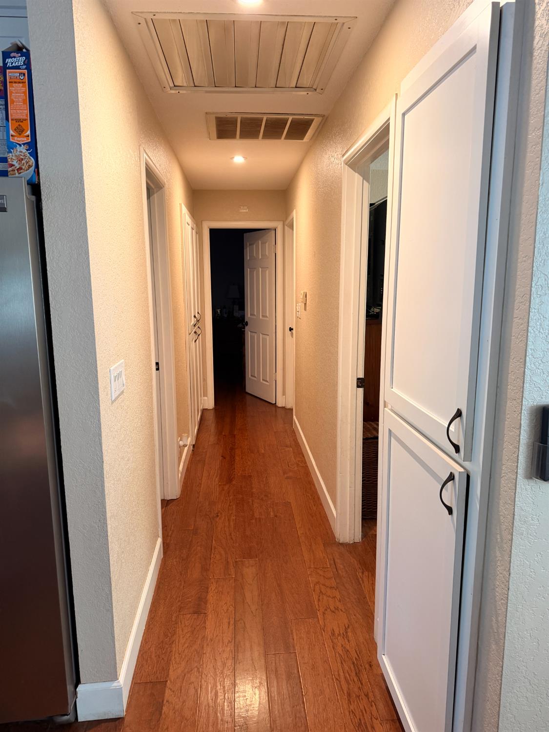 5645 20th Street Rio Linda, CA 95673 - Photo 34 of 69 corridor featuring a textured wall, dark wood-style floors, cooling unit, and recessed lighting