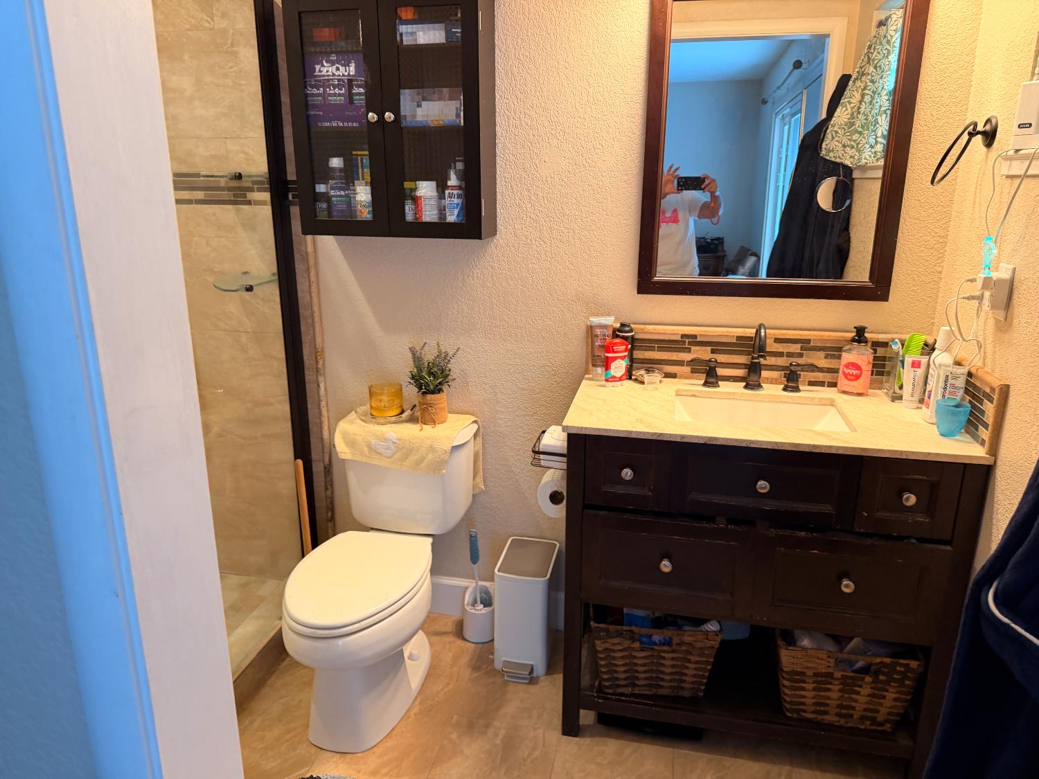 5645 20th Street Rio Linda, CA 95673 - Photo 42 of 69 master bathroom featuring a textured wall, vanity, and a stall shower