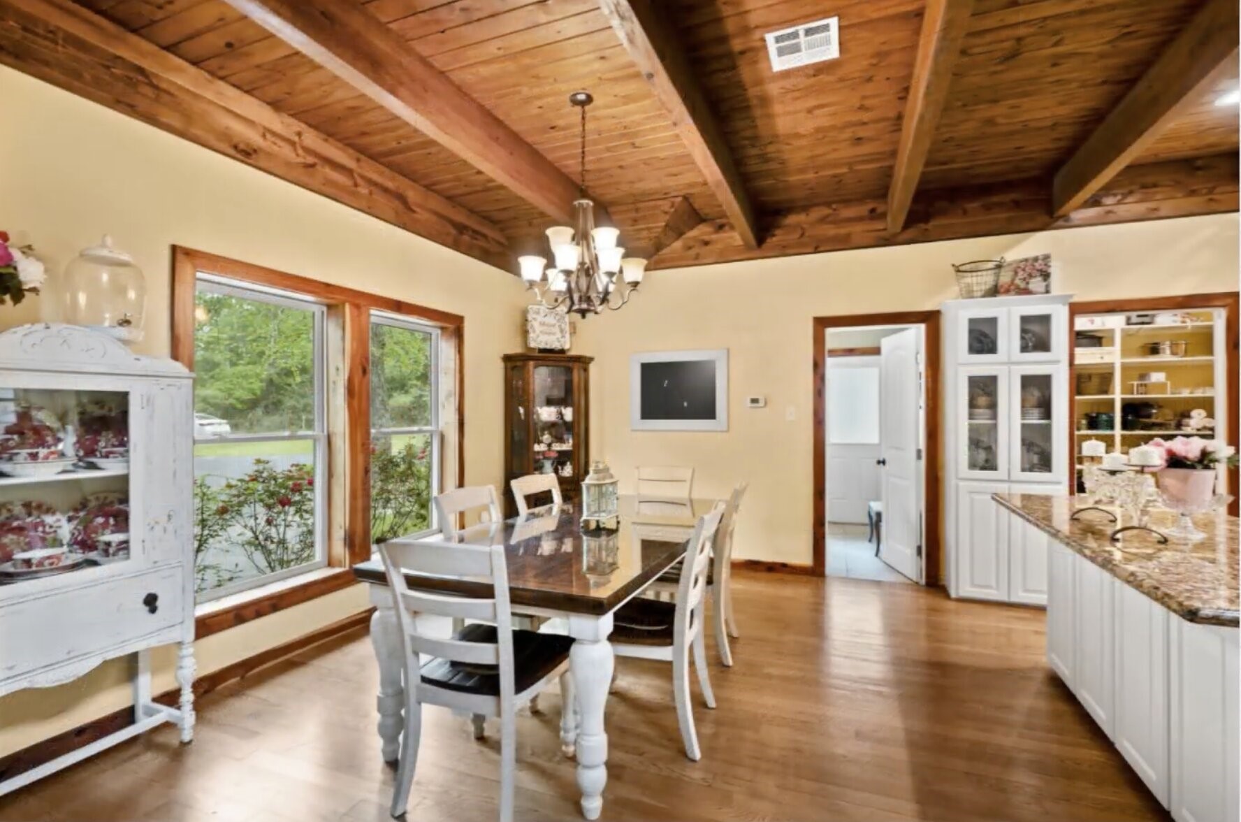30338 Riley Road Waller, TX 77484 - Photo 14 of 46 a view of a dining room with furniture window and wooden floor