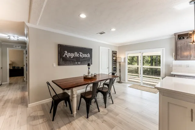a bathroom with a sink double vanity and a mirror