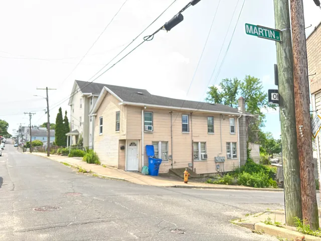 a front view of a house with a patio