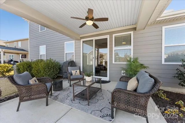 a outdoor space with patio the couches and a potted plant with outer view