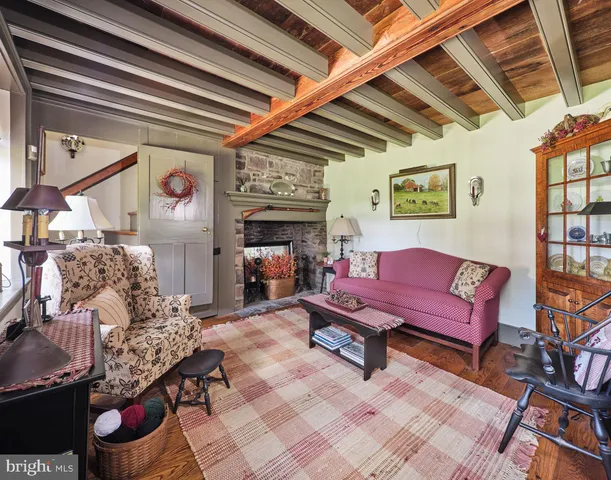 a spacious bathroom with a double vanity sink and a mirror