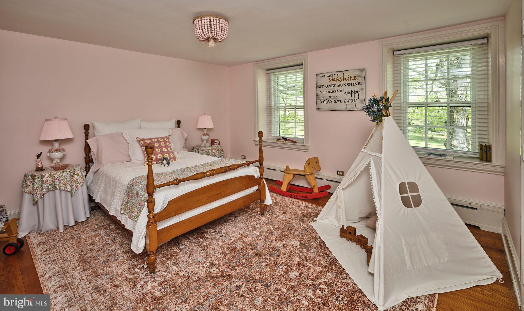 6398 Durham Road Pipersville, PA 18947 - Photo 24 of 68 a bed room with a bed and a window