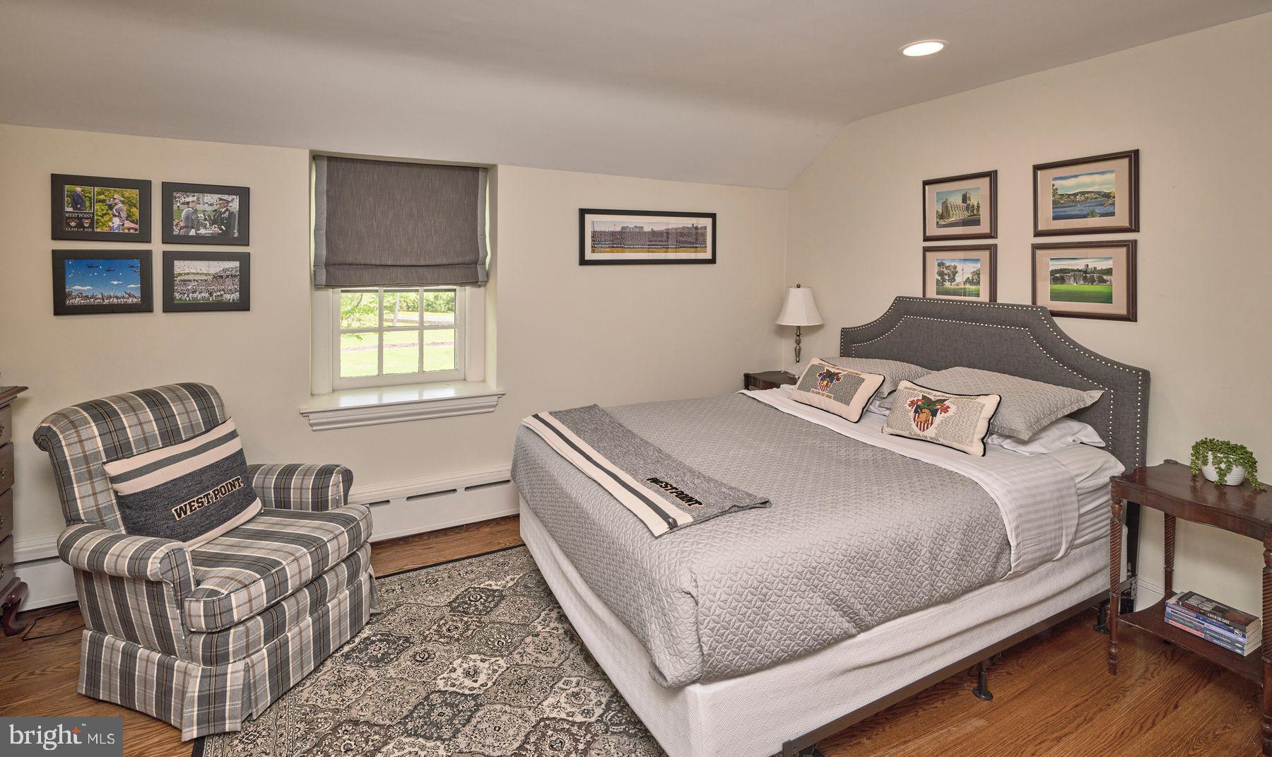 6398 Durham Road Pipersville, PA 18947 - Photo 27 of 68 a bedroom with a bed and wooden floor