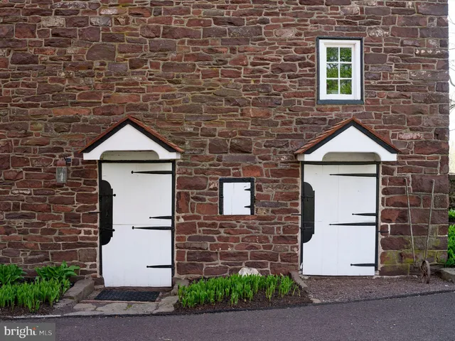 a kitchen with stainless steel appliances granite countertop a refrigerator a stove a sink and dishwasher