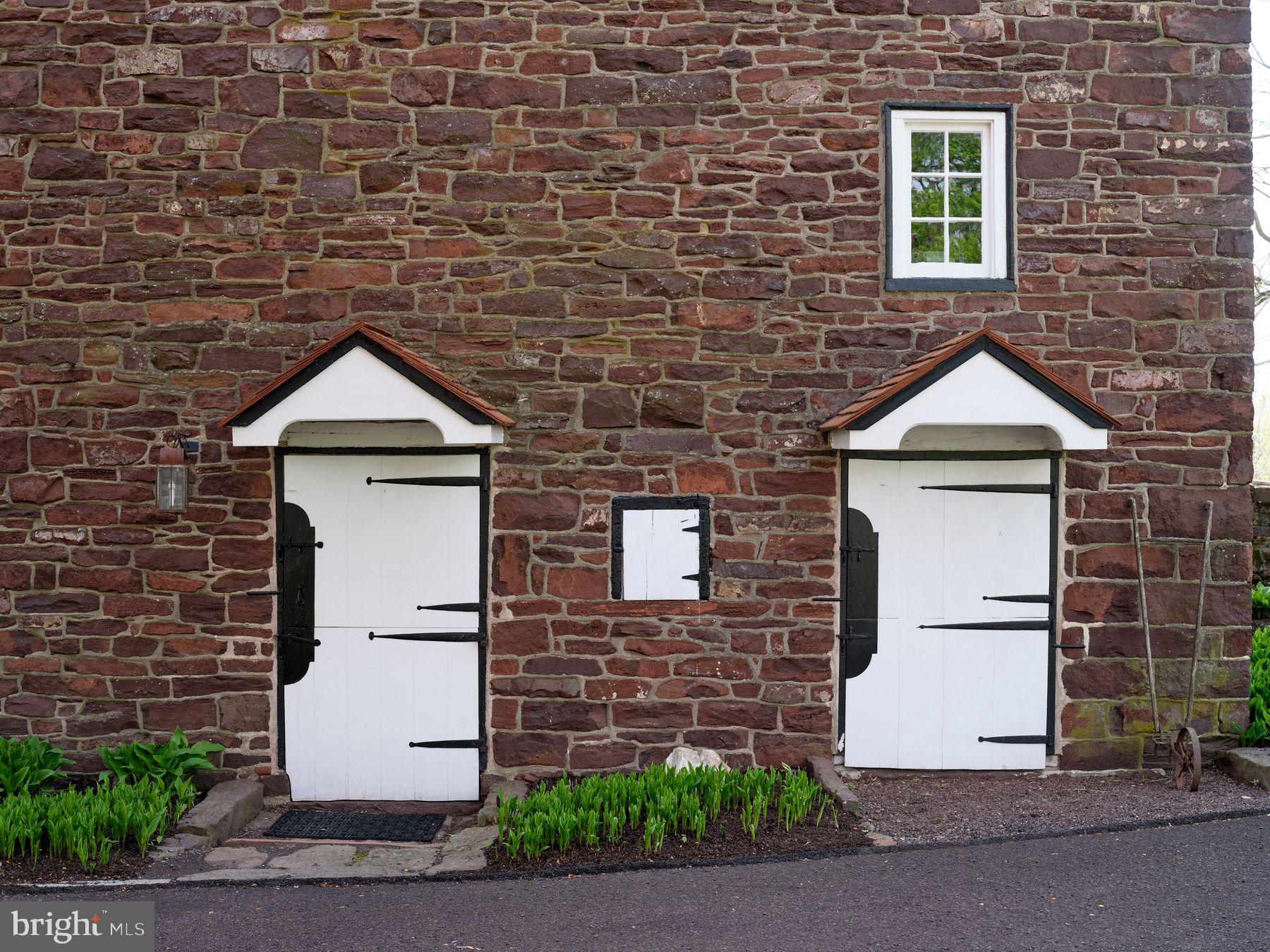 6398 Durham Road Pipersville, PA 18947 - Photo 33 of 68 a front view of a house with a yard and garage