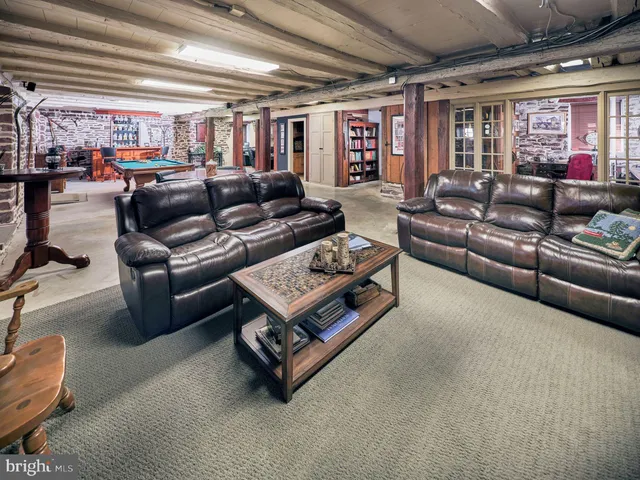 a view of a city with lush green forest