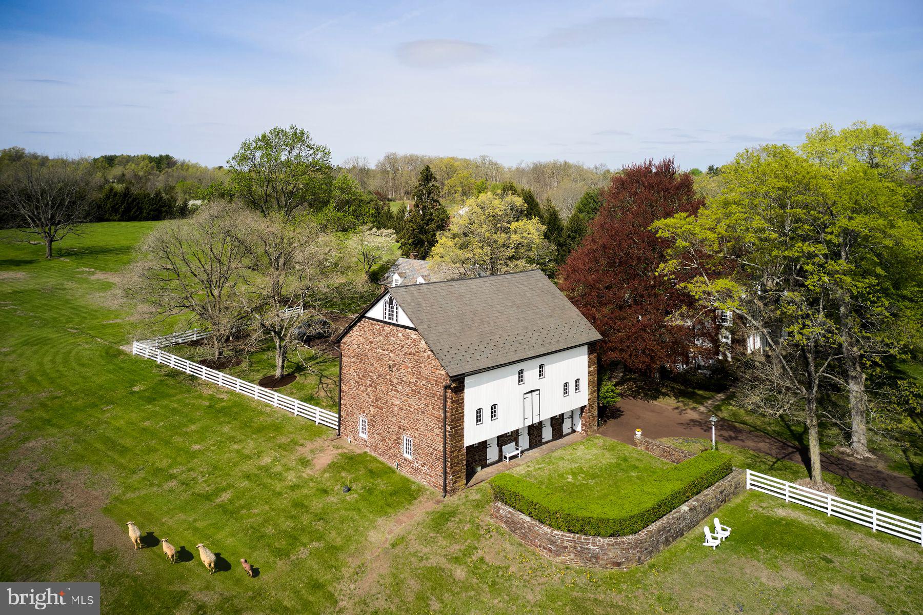 6398 Durham Road Pipersville, PA 18947 - Photo 53 of 68 a aerial view of a house with pool and a yard