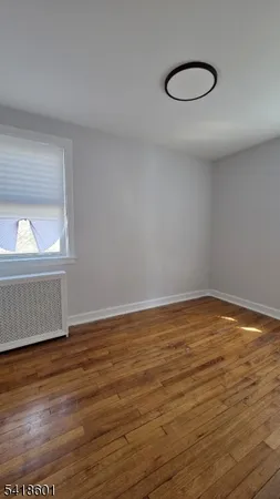a utility room with cabinets washer and dryer
