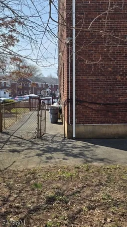 a house view with a backyard space