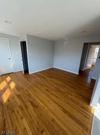 a kitchen with cabinets and window