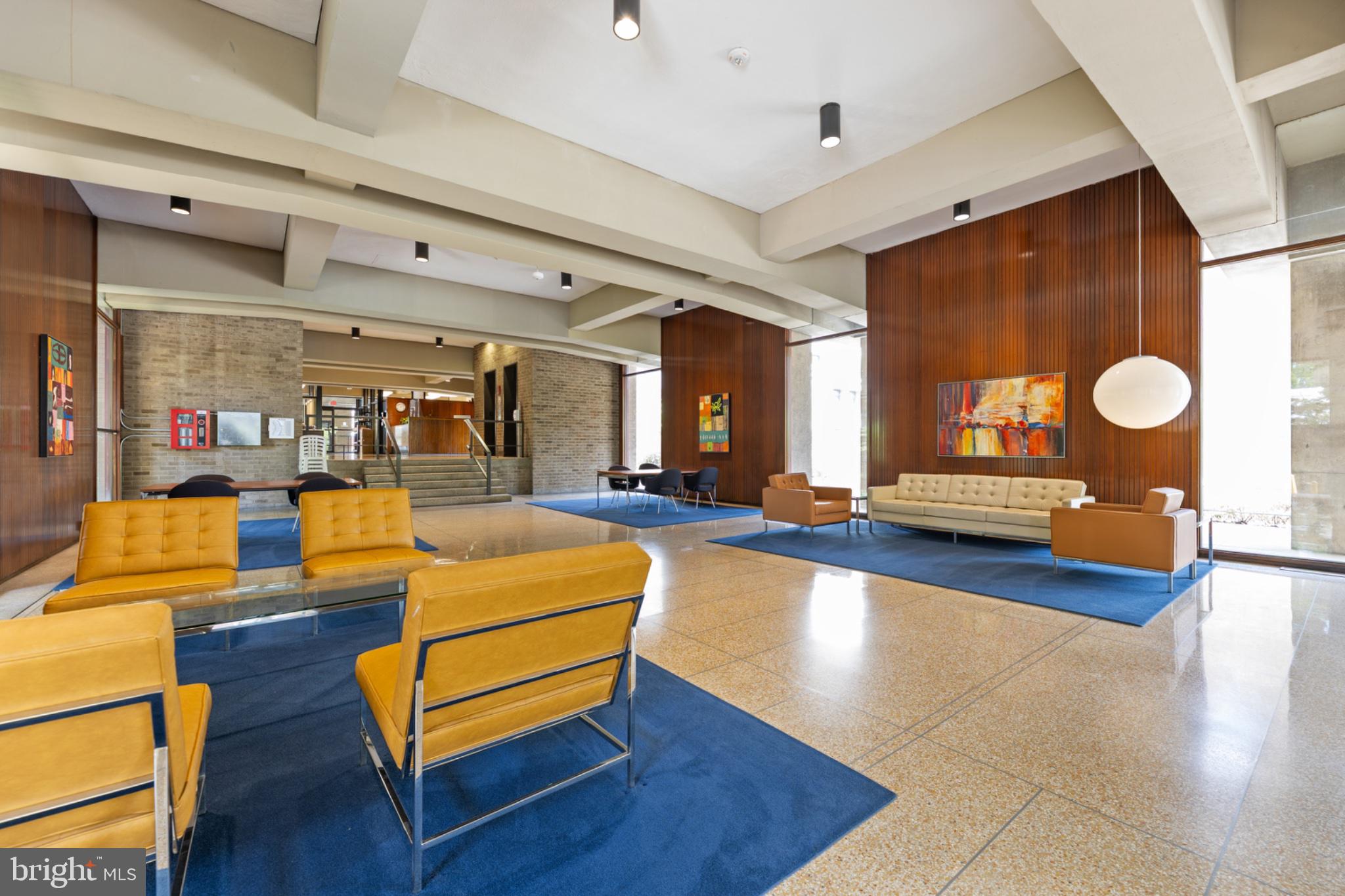490 M Street Southwest, Unit W101 Washington, DC 20024 - Photo 16 of 25 Modern elegance in a spacious lobby.