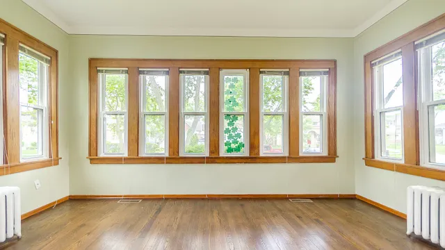 a kitchen that has a sink a stove and a window