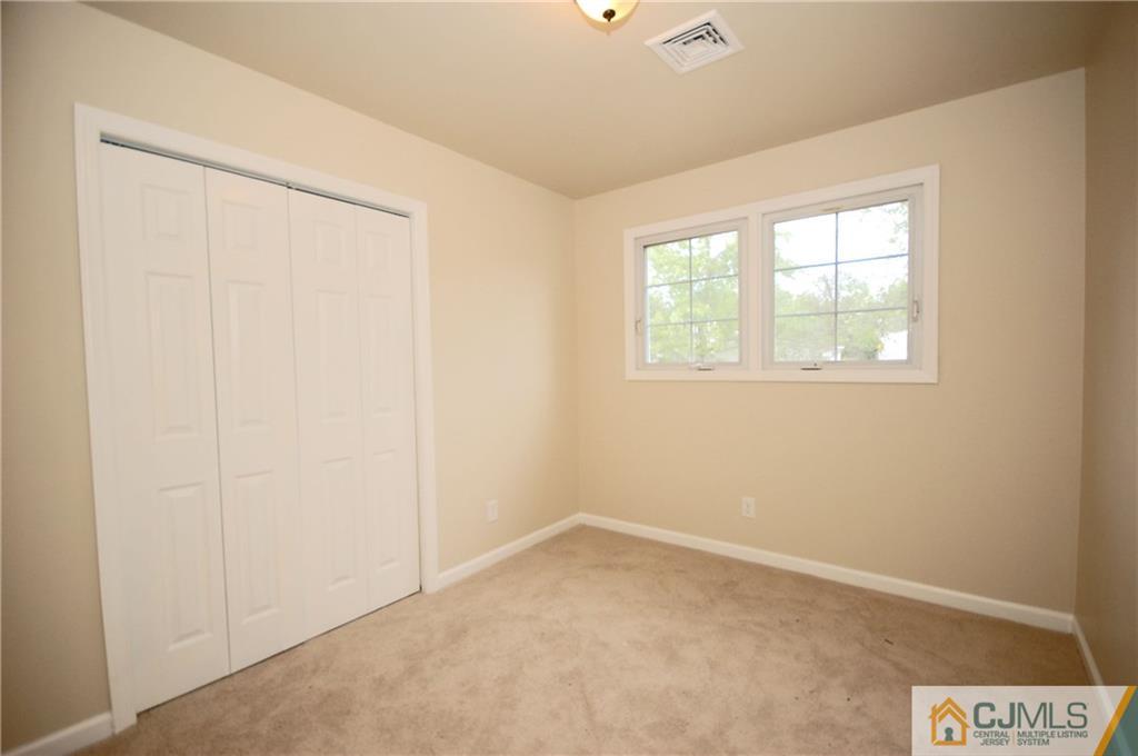 1227 Brookside Road Piscataway, NJ 08854 - Photo 12 of 22 an empty room with a window