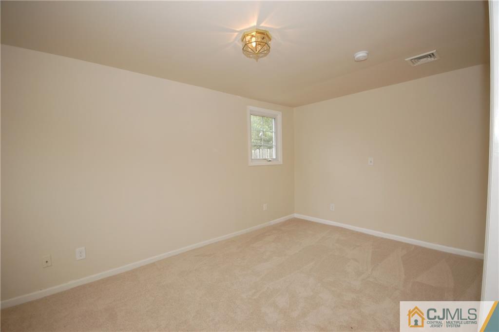 1227 Brookside Road Piscataway, NJ 08854 - Photo 13 of 22 a view of an empty room
