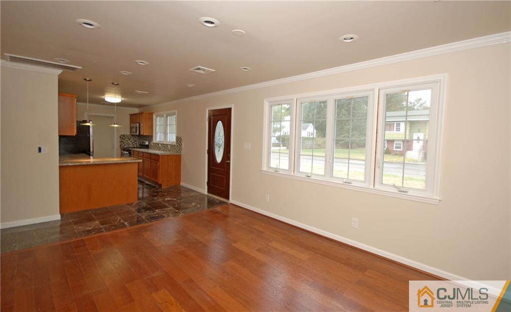 1227 Brookside Road Piscataway, NJ 08854 - Photo 8 of 22 a view of a kitchen with furniture and a window