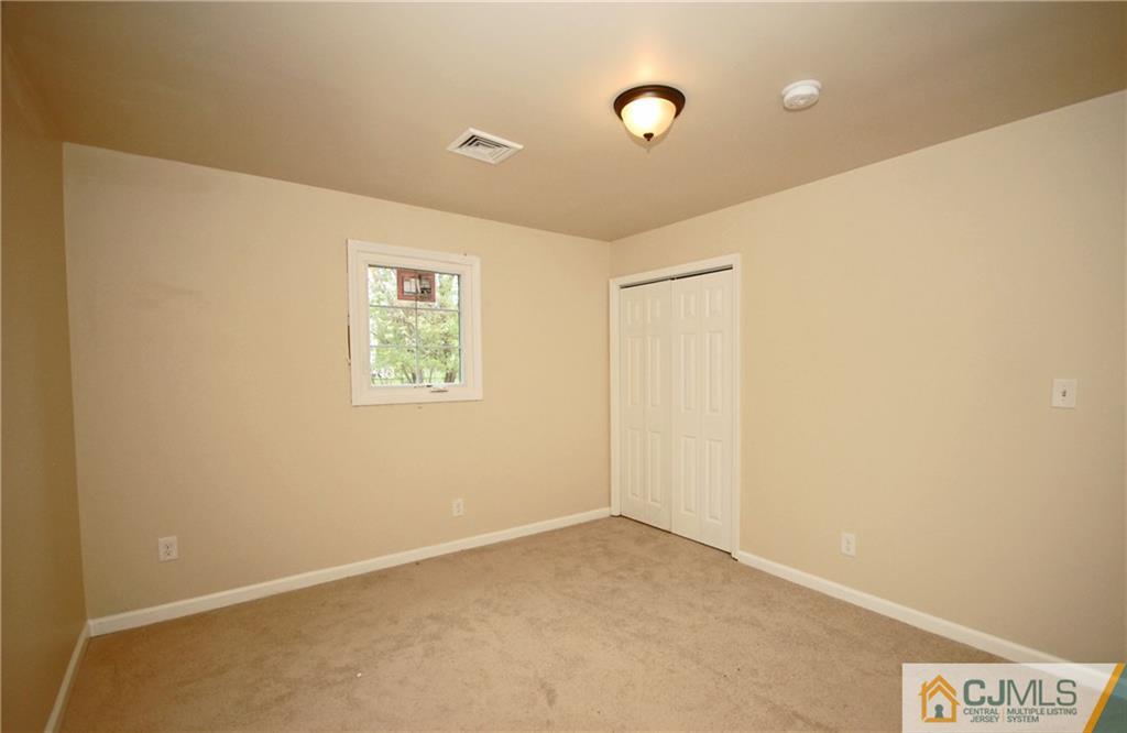 1227 Brookside Road Piscataway, NJ 08854 - Photo 10 of 22 a view of an empty room