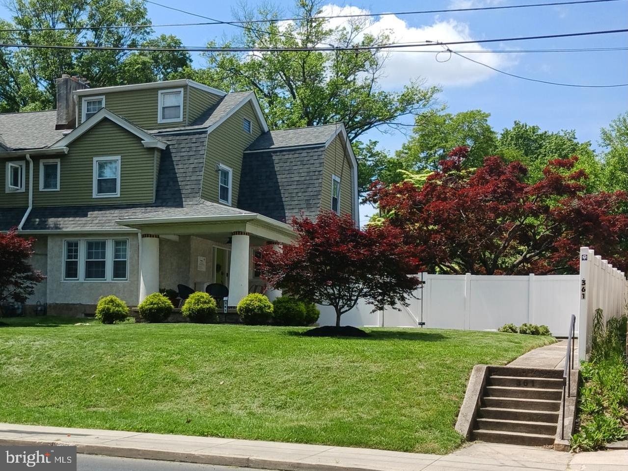 361 East Butler Avenue Ambler, PA 19002 - Photo 1 of 39 a front view of a house with garden