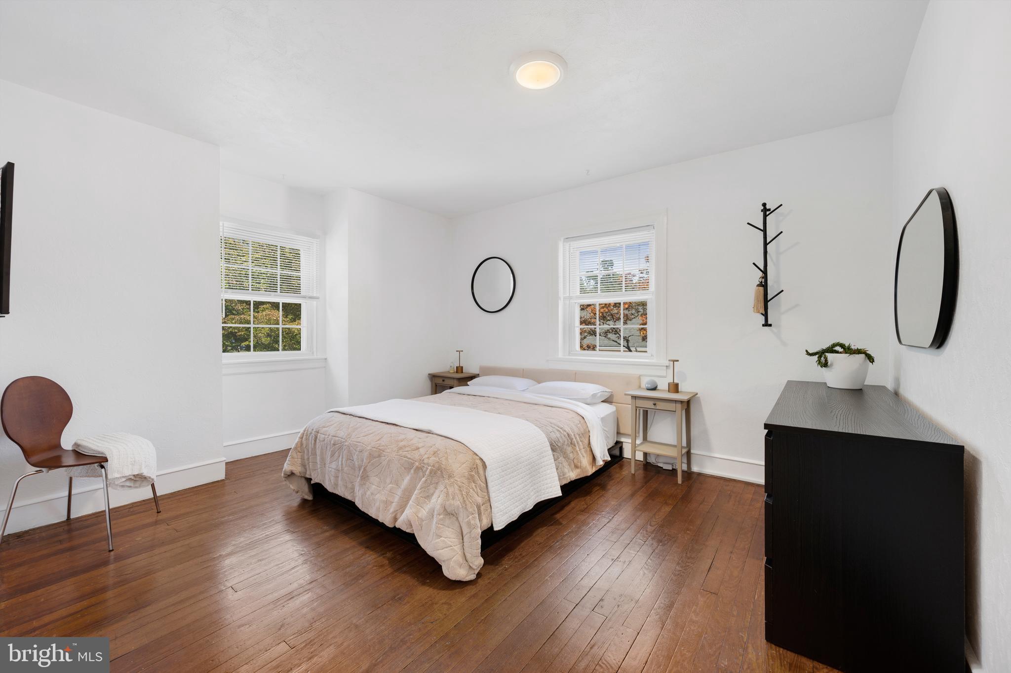 361 East Butler Avenue Ambler, PA 19002 - Photo 20 of 39 a bedroom with a bed and a chair