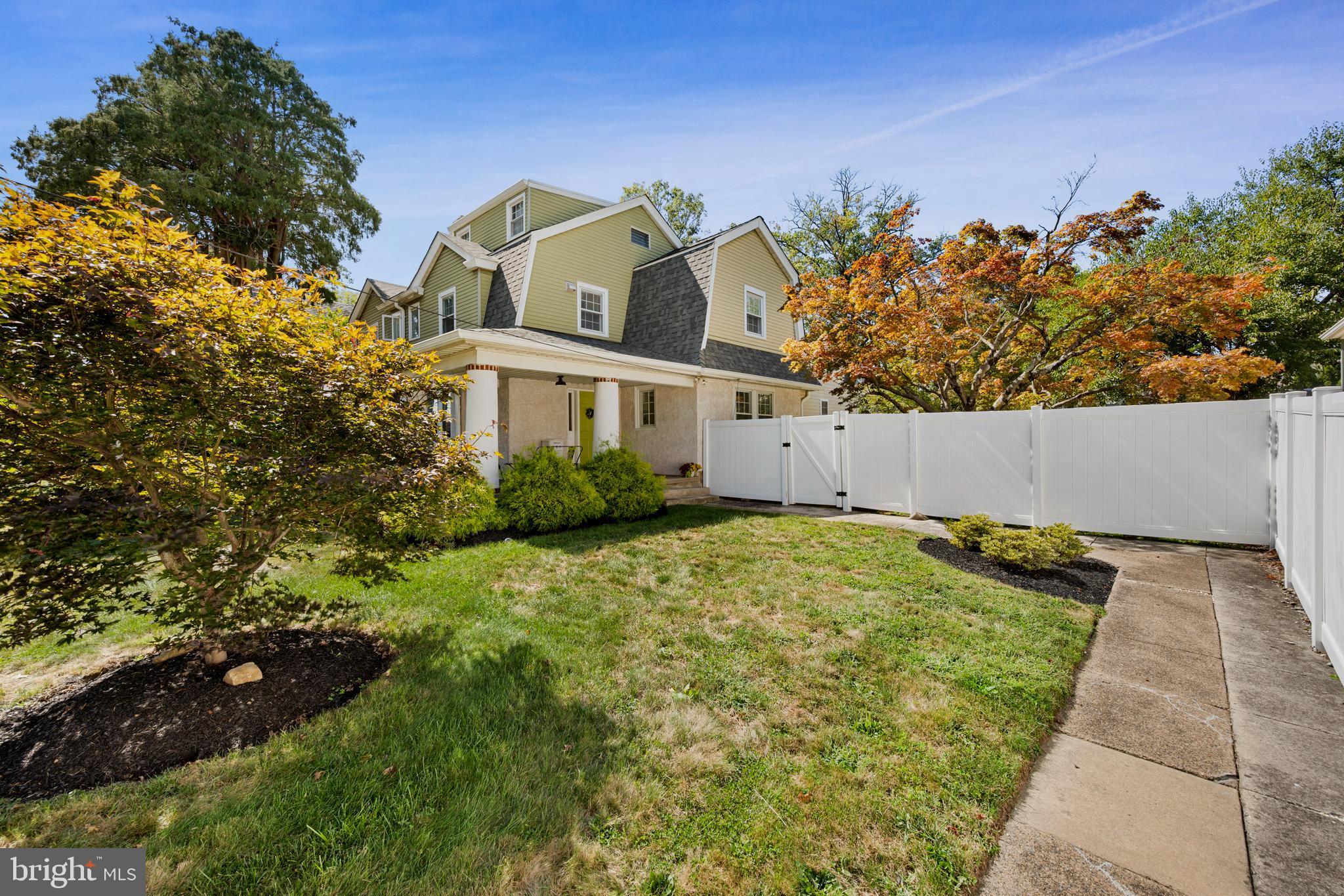 361 East Butler Avenue Ambler, PA 19002 - Photo 2 of 39 a view of a house with a backyard and a garden