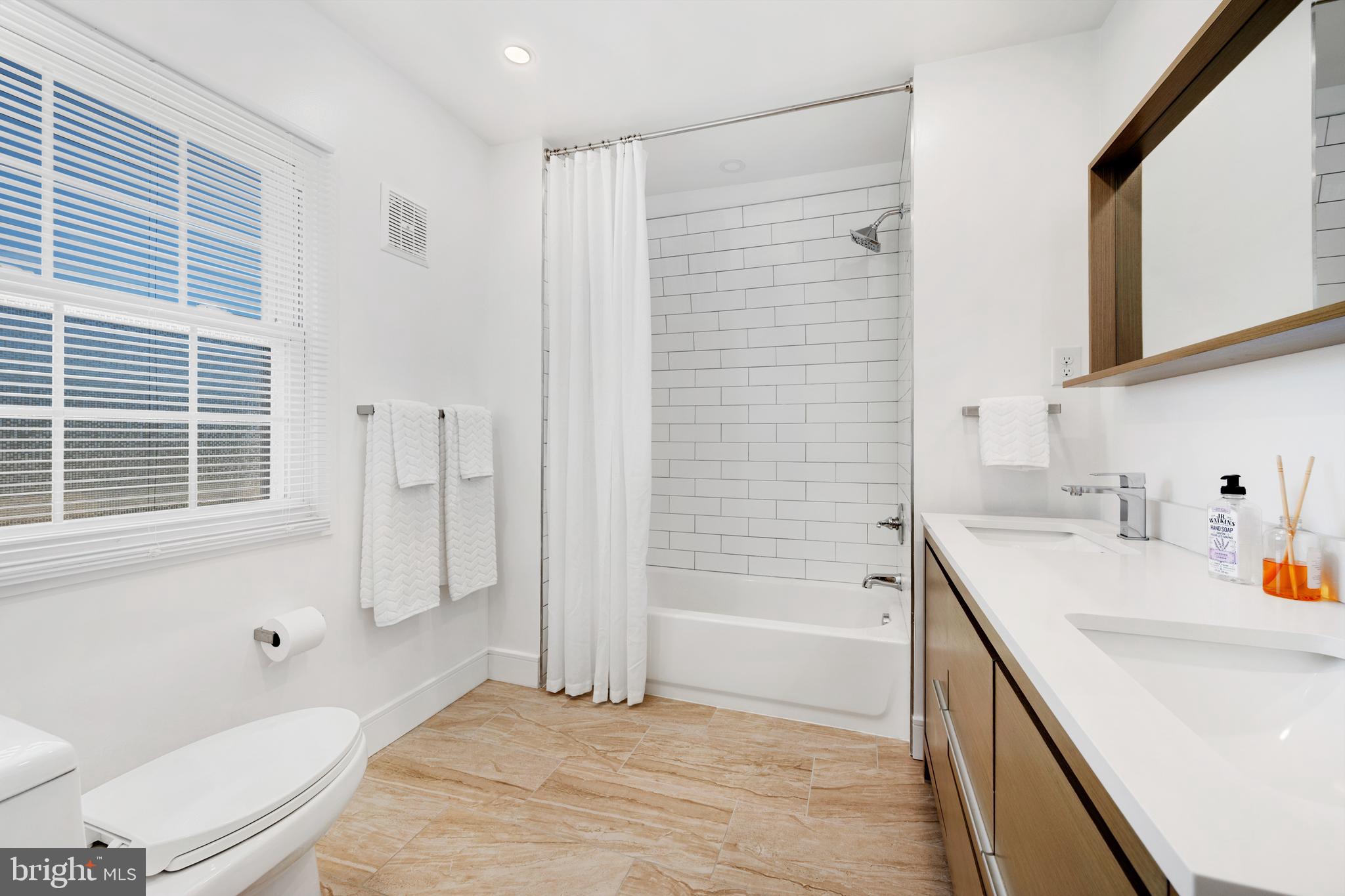 361 East Butler Avenue Ambler, PA 19002 - Photo 26 of 39 a bathroom with a sink a toilet and shower